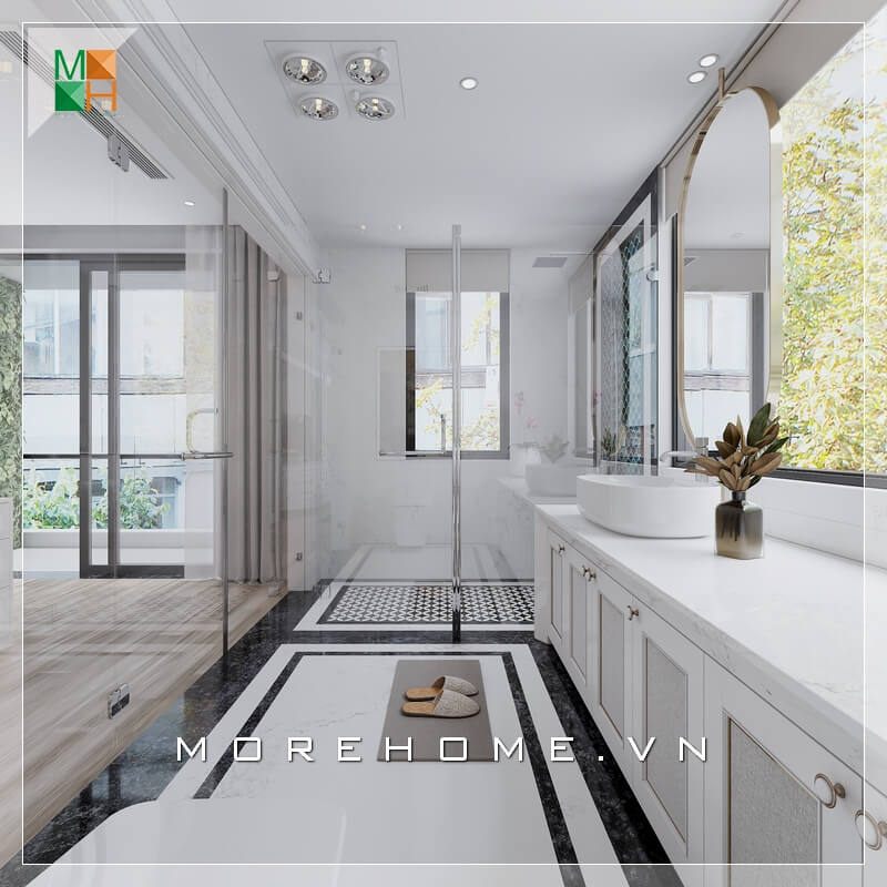 Mẫu phòng tắm hiện đại cho nhà phố, chung cư, biệt thự với mặt tủ và lavabo làm từ đá nhân tạo kết hợp gỗ công nghiệp chống ẩm cho không gian phòng tắm trở nên trẻ trung. Buồng tắm sử dụng vách kính cường lực trong suốt tạo sự liền mạch trong không gian